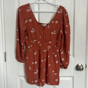 Floral peach coloured romper